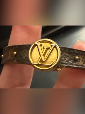 Authentic Louis Vuitton Gold and Brown Monogram Round Charm Leather Bracelet